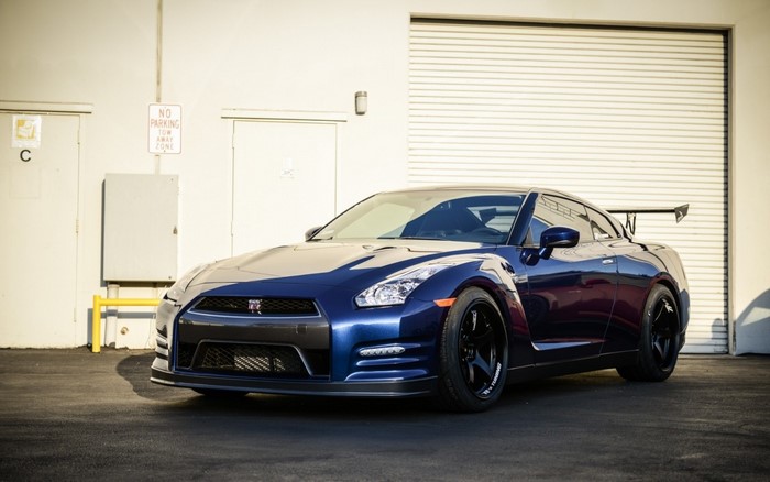 Blue Nissan GT-R with a large rear spoiler