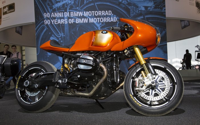 Orange BMW R nineT motorcycle at BMW Motorrad exhibition