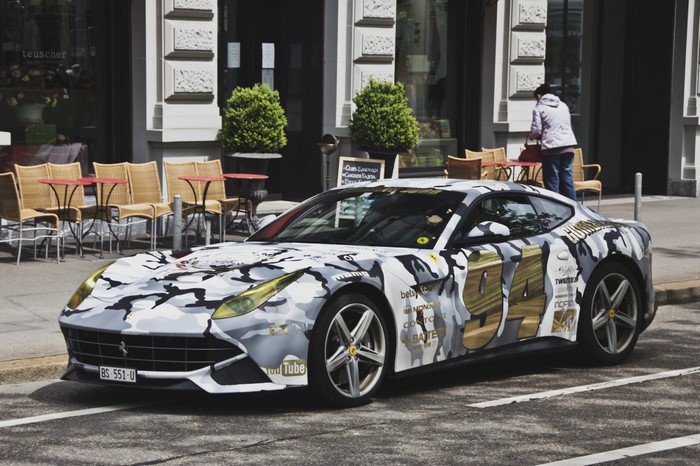 Ferrari F12berlinetta with camouflage wrap and racing decals