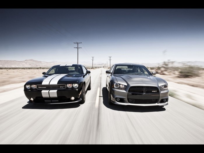 Dodge Challenger and Dodge Charger SRT on a desert road