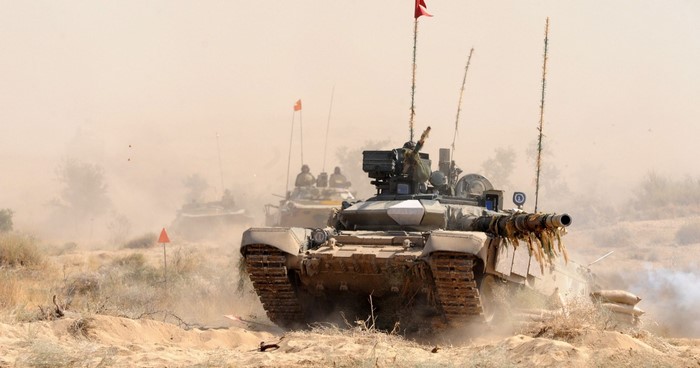 Indian Army T-90 tanks in desert combat exercise