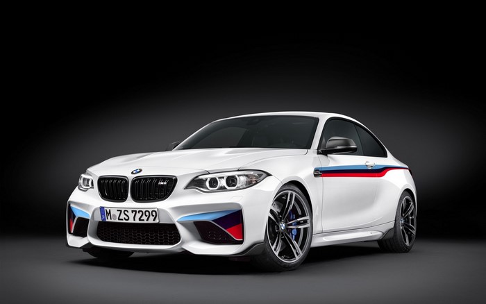 White BMW M2 Competition sports car with racing stripes