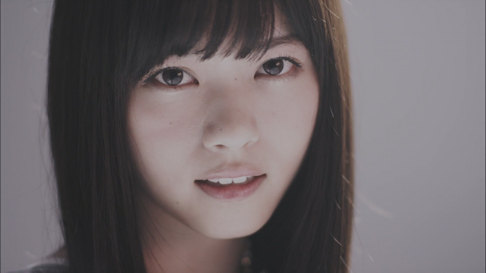 Close-Up Portrait of Asian Woman with Long Black Hair