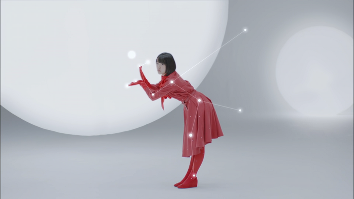 Woman in red dress with constellation overlay
