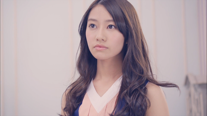 Asian woman with long brown hair