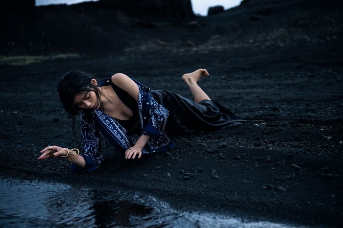 Model Ming Xi on black sand beach