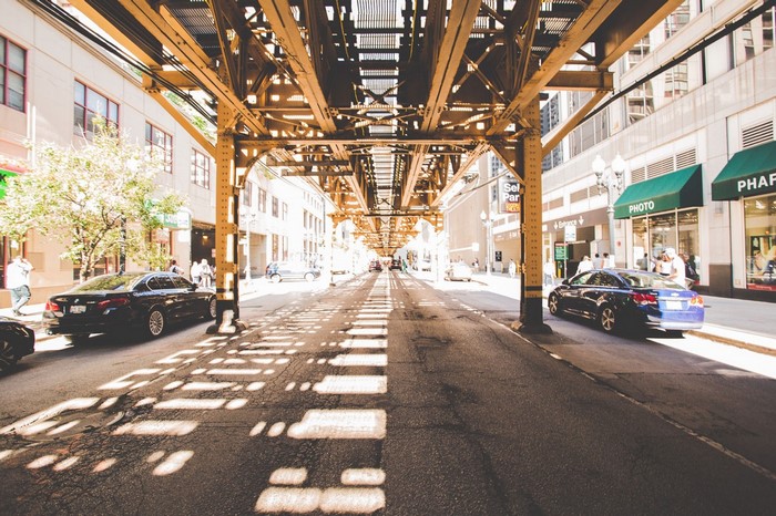 Street under elevated train tracks in Chicago