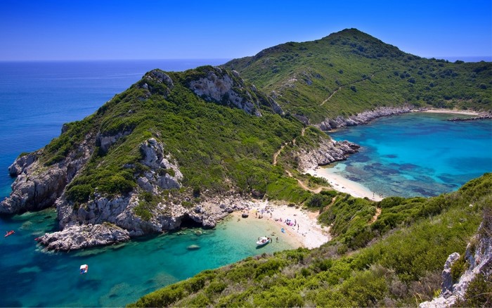 Scenic bay with green hills and turquoise water