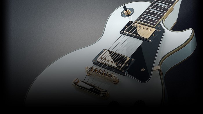 White Gibson Les Paul Electric Guitar with Gold Accents