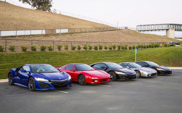 Acura NSX sports cars parked in a lot