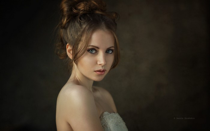 Portrait of a young woman with brown hair