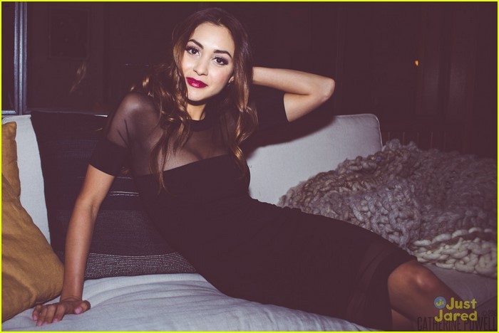 Lindsey Morgan in a black dress