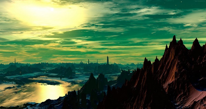 Alien landscape with mountains and glowing sky