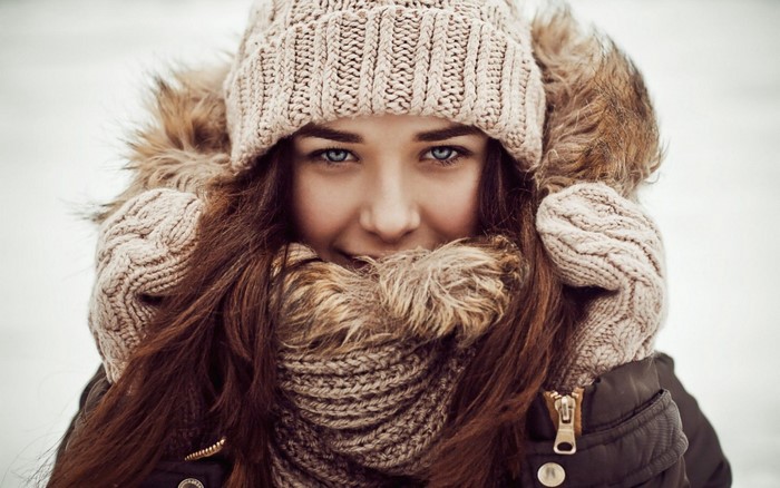 Woman in winter hat and scarf