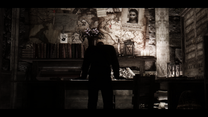 Man in suit in dimly lit room with maps and posters