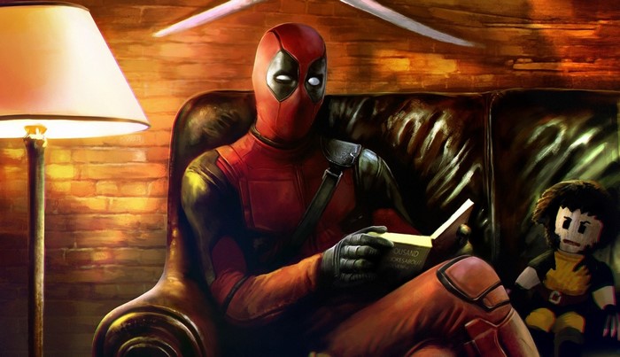 Deadpool reading a book on a couch