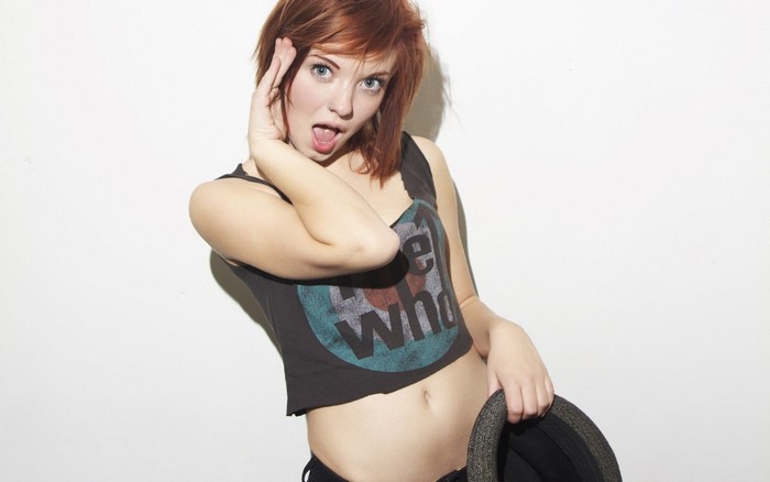 Redhead girl with nose ring and Who shirt