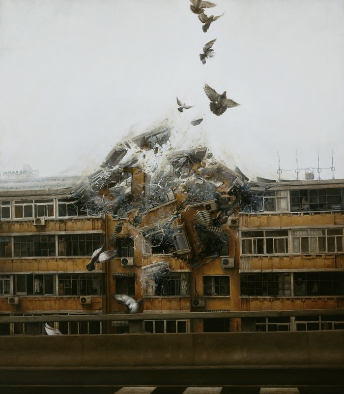 Building collapsing with pigeons flying away