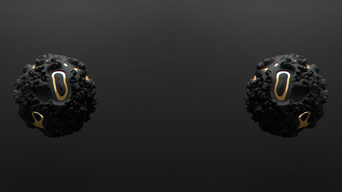 Two abstract black and gold 3D objects on a dark background
