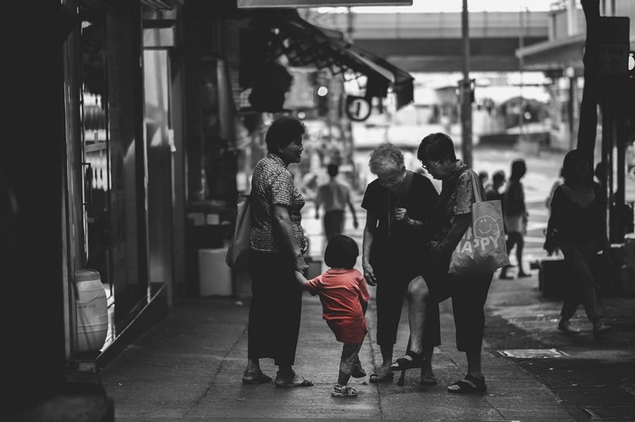 Selective coloring of elderly women and child on street