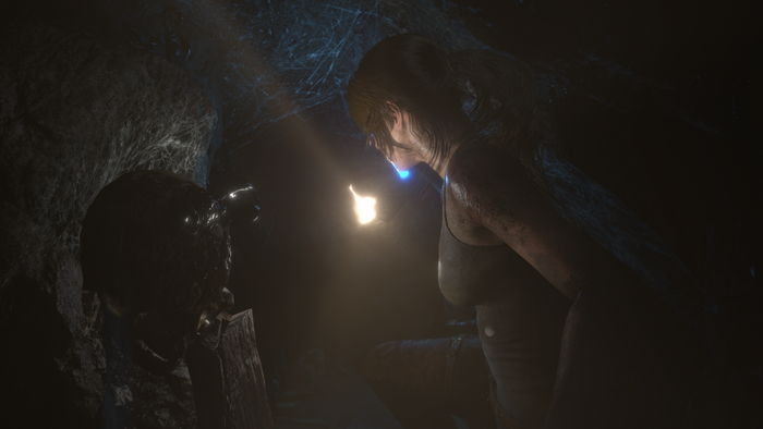 Lara Croft from Rise of the Tomb Raider in a cave