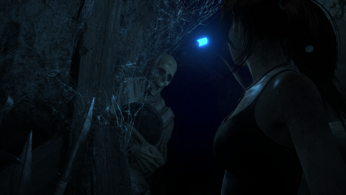 Lara Croft from Rise of the Tomb Raider with a skeleton