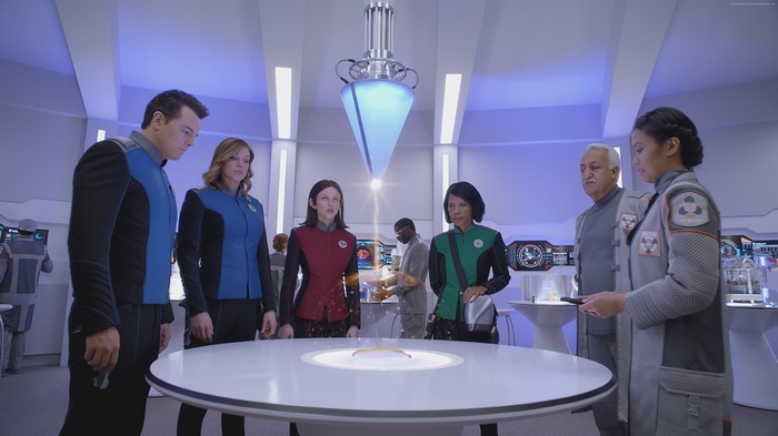 The Orville crew in a futuristic room