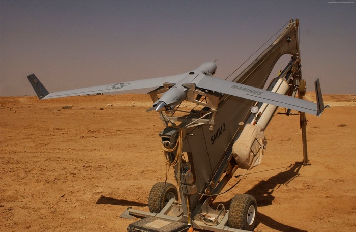 ScanEagle UAV on launch platform in desert
