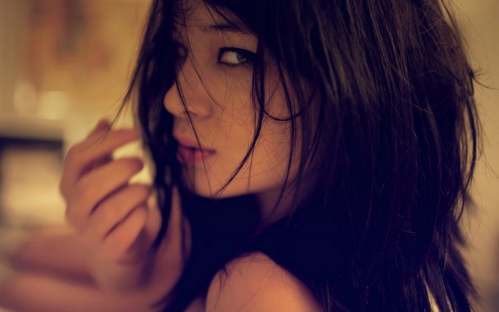 Close up portrait of a young woman with dark hair