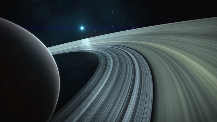 Planet with rings and a star in space