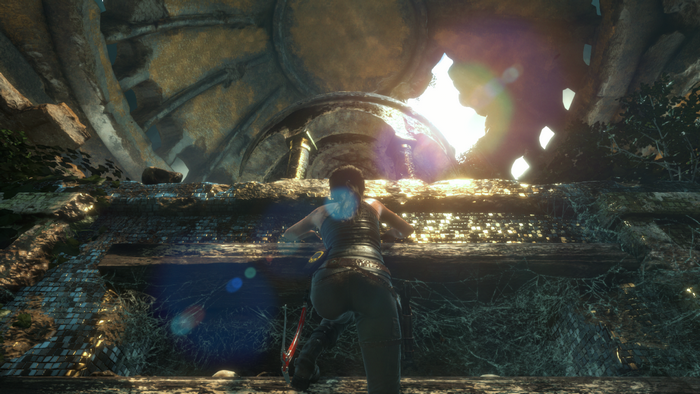 Lara Croft from Tomb Raider climbing in ruins