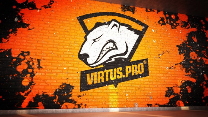 Virtus.Pro logo on a brick wall with paint splatters