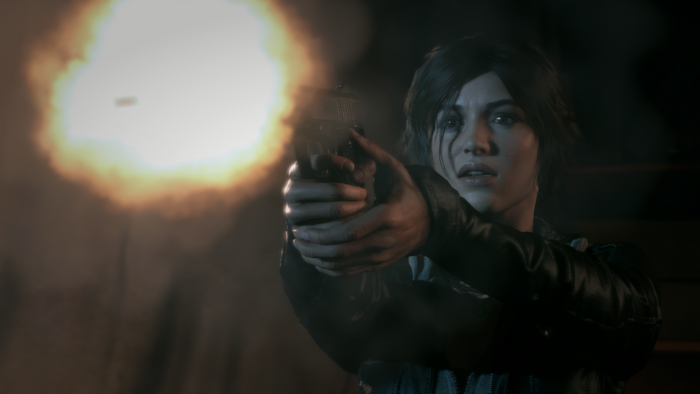Lara Croft firing a gun in Rise of the Tomb Raider