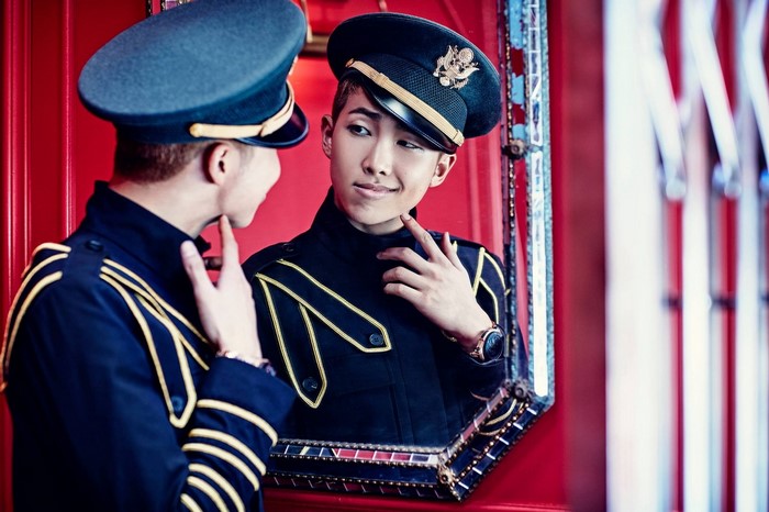 Rap Monster from BTS in a military-style uniform