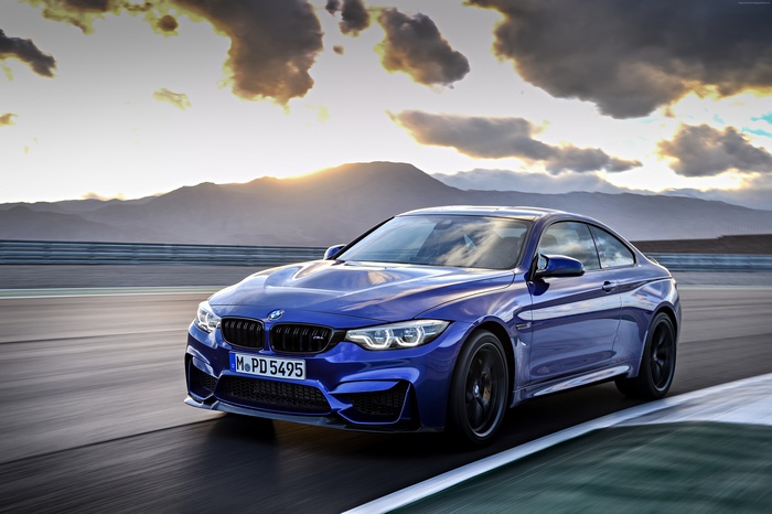 Blue BMW M4 CS on a Racetrack