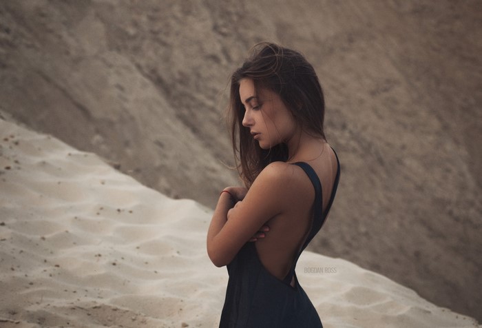 Portrait of Woman in Black Dress on Sand Dunes