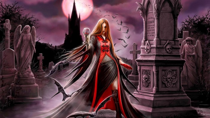 Gothic vampire woman in a graveyard with bats