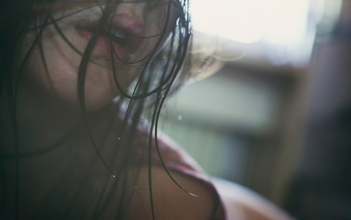 Close up of a woman with wet hair