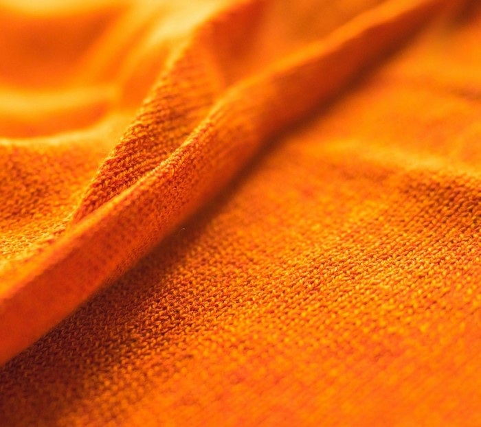 Close-up of orange fabric texture