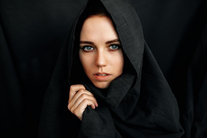 Woman wearing a black veil