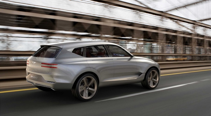 Genesis GV80 concept crossover driving on a bridge
