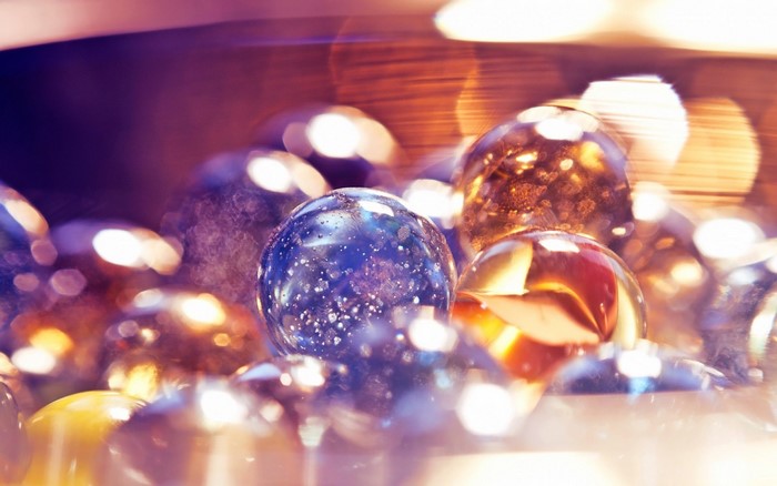 Close-up macro photography of colorful glass marbles