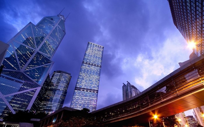 Skyscrapers at night with dramatic clouds