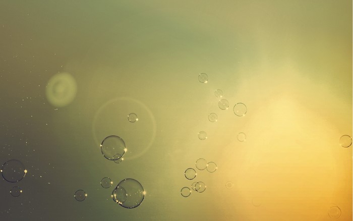 Bubbles floating in sunlight