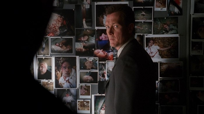 John Doggett from The X Files in front of a crime board