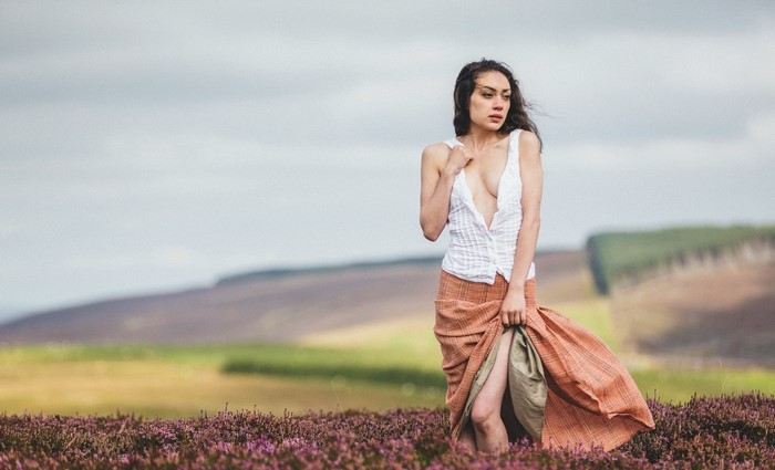 Woman in a field of flowers