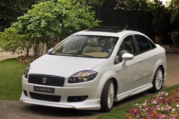 White Fiat Linea sedan parked on a driveway