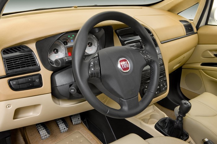 FIAT car interior with steering wheel and dashboard