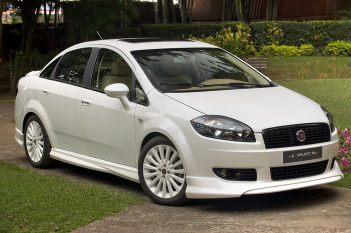 White Fiat Linea sedan parked on a driveway