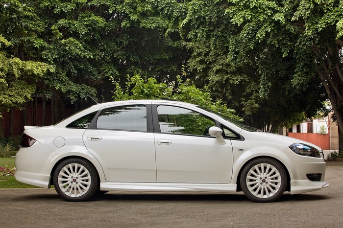 White Fiat Linea sedan parked outdoors